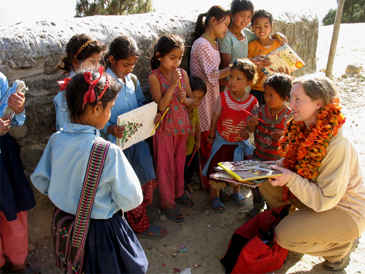 Jeri Handing out books.JPG